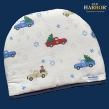 Load image into Gallery viewer, Old Harbor Holiday Trucks Tea Cozy (29 x 23 cm)