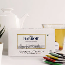 Load image into Gallery viewer, Old Harbor 25 Assorted Tea bags include Tulsi green tea, Lemon green tea, Mint green tea, Earl Grey tea & Masala tea. All give a refreshing and rich aroma and many health benefits that one can enjoy.