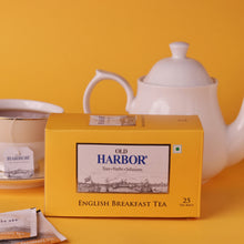 Load image into Gallery viewer, Old Harbor English Breakfast Tea is an exquisite blend of the finest black teas. This blend is the perfect companion for your morning breakfast and can be enjoyed at any time of the day.  Can be consumed with milk &amp; sweeteners.  Delightful blend. Rich and smooth flavour with medium strength. Staple-free tea bags and microwavable. Each tea bag is individually enveloped.
