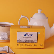 Load image into Gallery viewer, Old Harbor English Breakfast Tea is an exquisite blend of the finest black teas. This blend is the perfect companion for your morning breakfast and can be enjoyed at any time of the day.  Can be consumed with milk & sweeteners.  Delightful blend. Rich and smooth flavour with medium strength. Staple-free tea bags and microwavable. Each tea bag is individually enveloped.