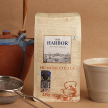 Load image into Gallery viewer, Old Harbor Rakhi Gift Hamper | Premium CTC Tea (250g), Chai Masala (100g) &amp; Kulhad Cups | Festive Tea Gift Box for Brother/Sister | Raksha Bandhan Special
