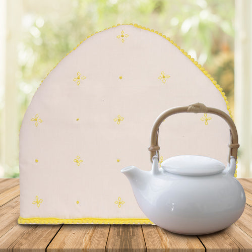 Old Harbor Tea Cozy is a Daily Home essential.  It is a tea warmer that effectively sustains freshness for a long time. It is handcrafted in India and it also helps to insulate the teapot through the soft wadding used .  These are available in different designs .  Have your tea fresh and tasty even after a long time of making.  it is also preferred for gifting on special occasions.  Kindly dry clean only.